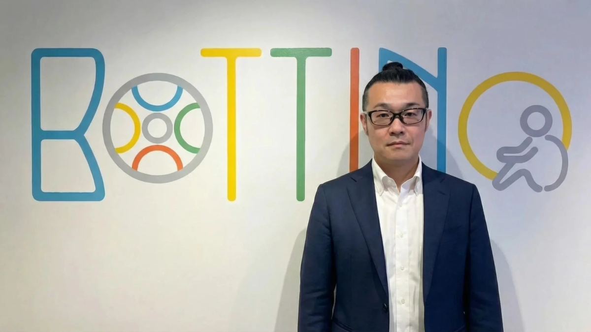 BOTTINOロゴと男性