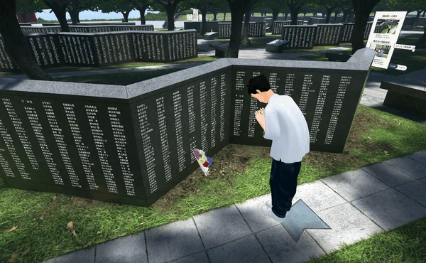 メタバース内のアバターと石碑