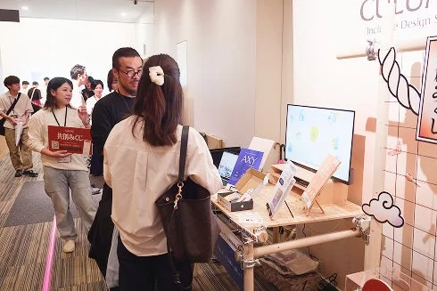 イベントブースでのAXY紹介